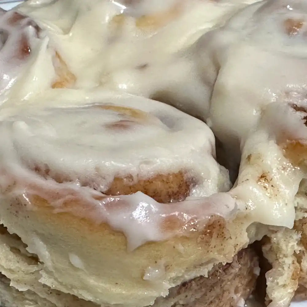 Iced cinnamon roll in Reno, NV with thick cream cheese frosting